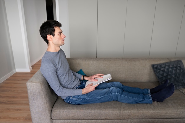 Free photo blind man reading using the braille language