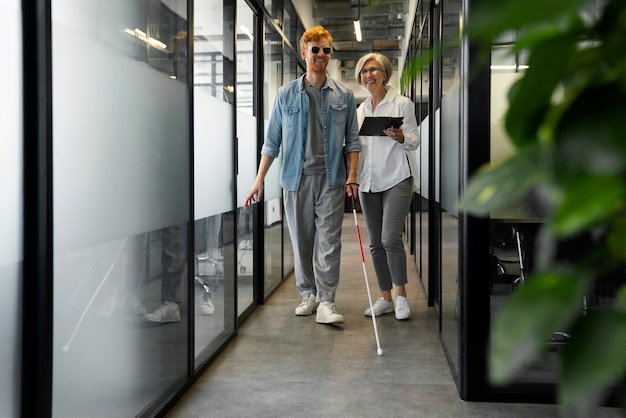 Blind person working at an inclusive office job