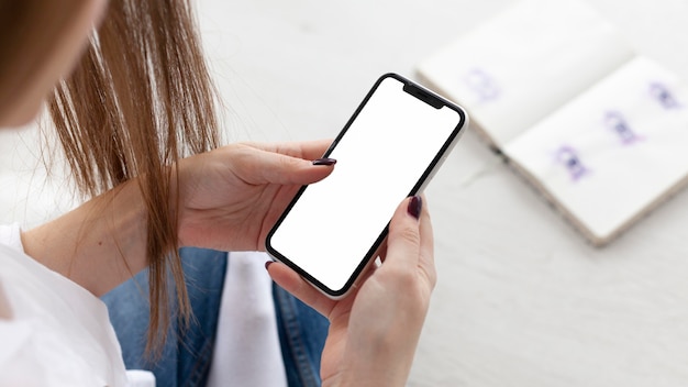 Blogger checking a blank phone