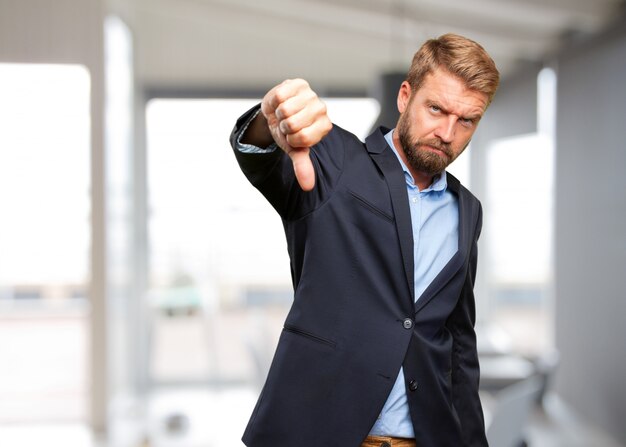 blond businessman angry expression