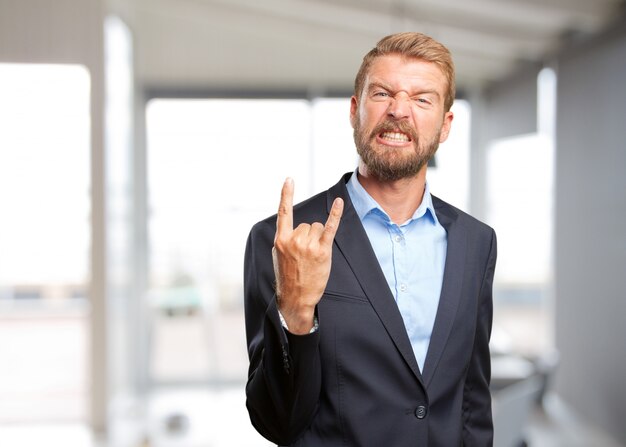 blond businessman angry expression