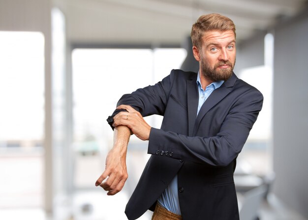 blond businessman angry expression