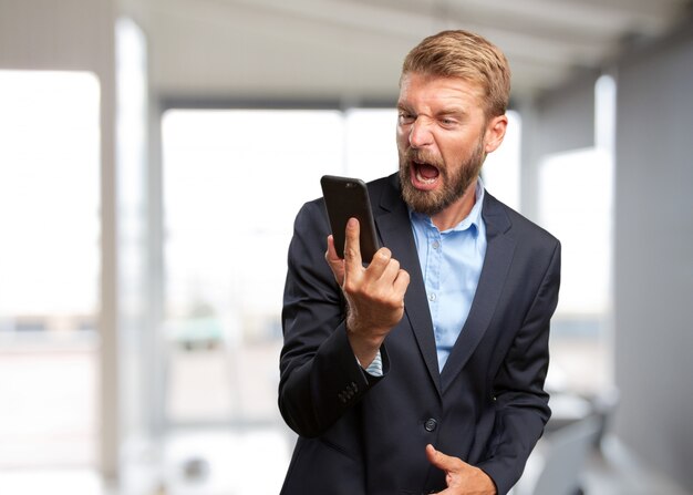 blond businessman angry expression