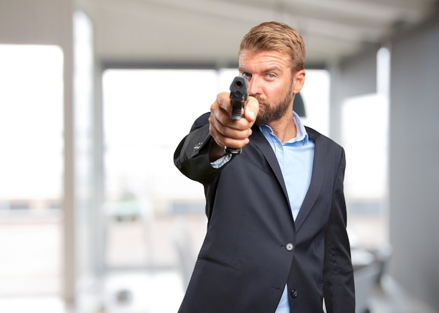 blond businessman angry expression