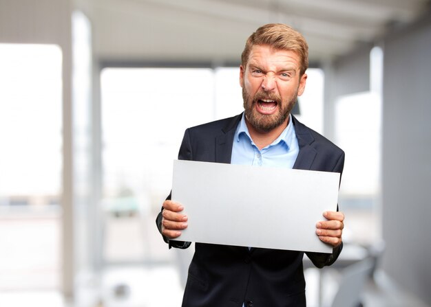 blond businessman angry expression