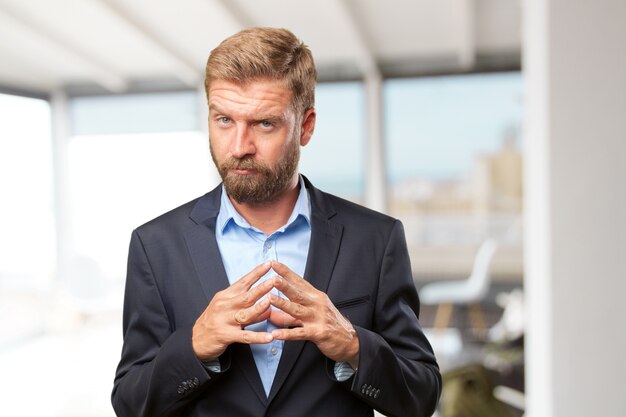 blond businessman happy expression