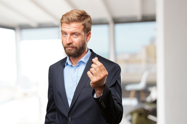 blond businessman happy expression