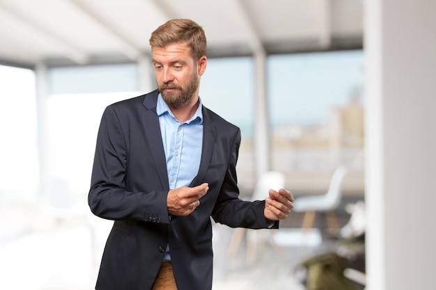 blond businessman happy expression