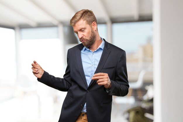 blond businessman happy expression