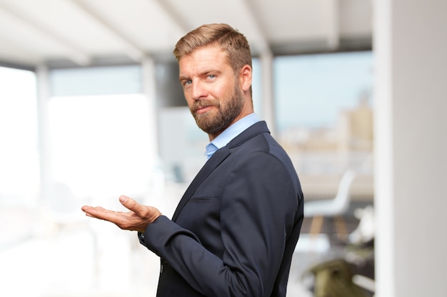 blond businessman happy expression