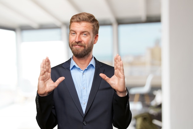 blond businessman happy expression