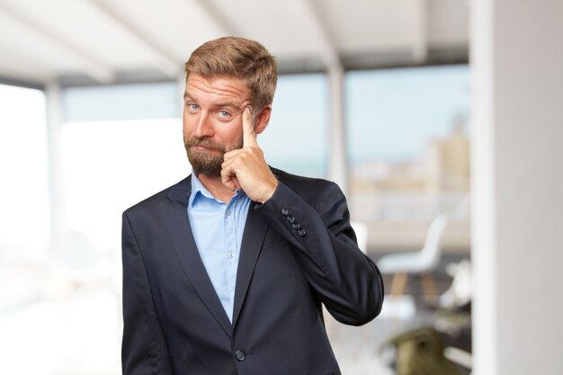 blond businessman happy expression