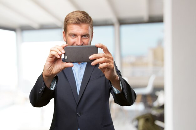 blond businessman happy expression