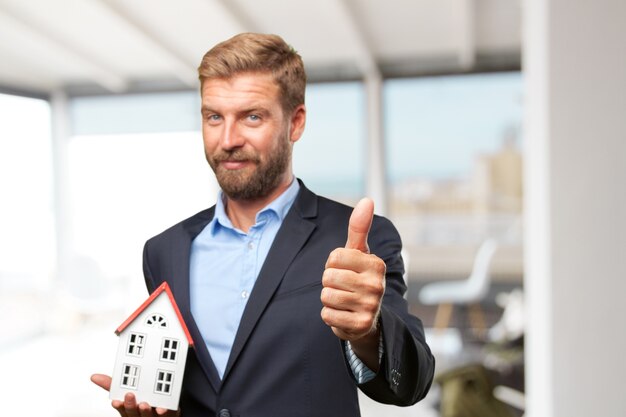 blond businessman happy expression