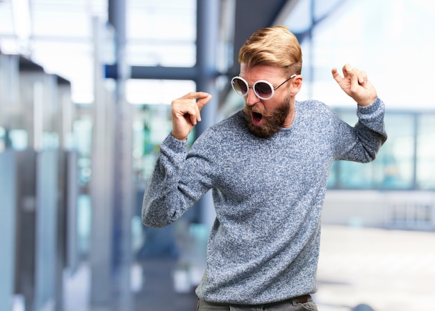 blond hipster man. happy expression