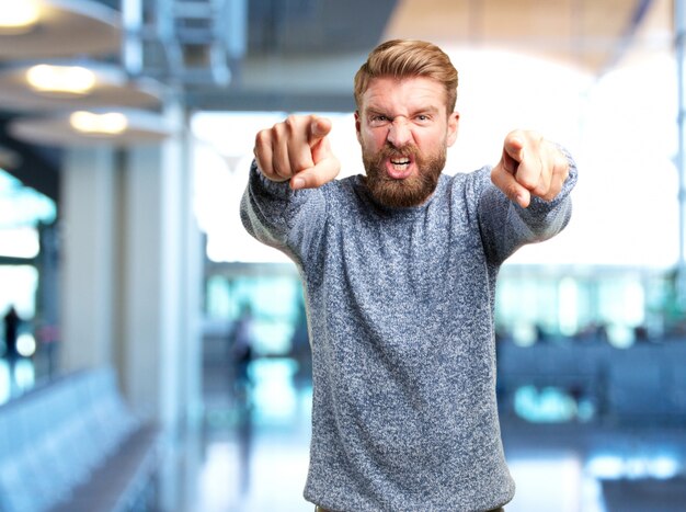 blond man angry expression