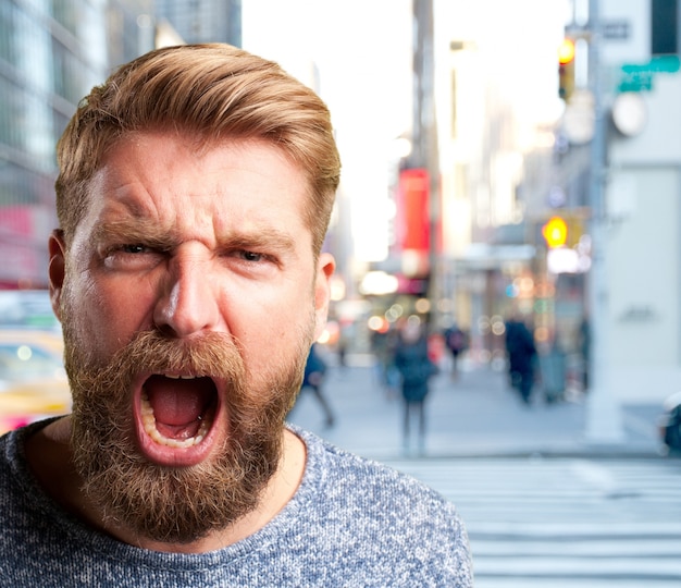 blond man angry expression