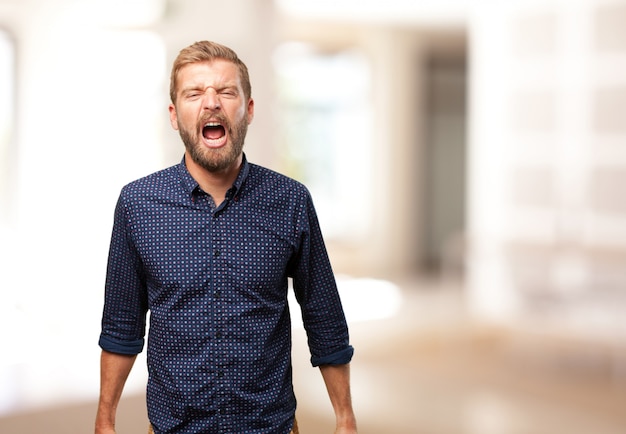 blond man angry expression