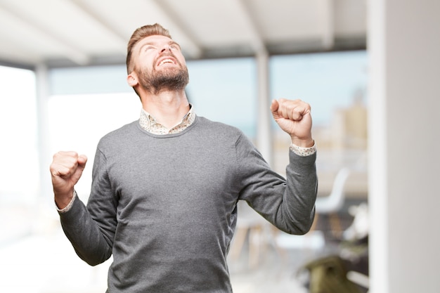 Free photo blond man. happy expression