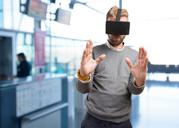 blond man with virtual glasses. surprised expression