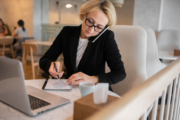 Blonde business woman working