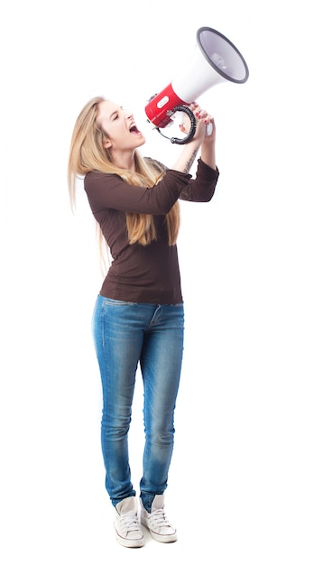 Free photo blonde girl using a megaphone