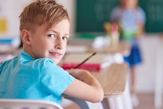 Blonde hair boy during the lesson