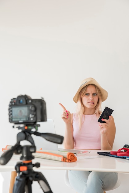 blonde influencer recording holidays video