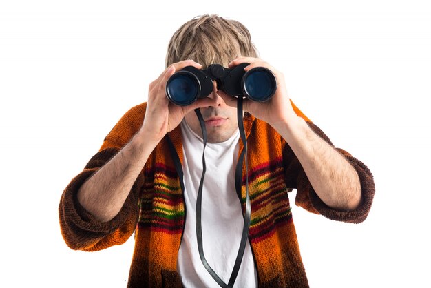 Blonde man with binoculars