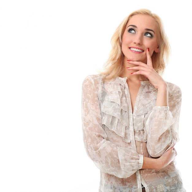 Blonde woman looking upwards