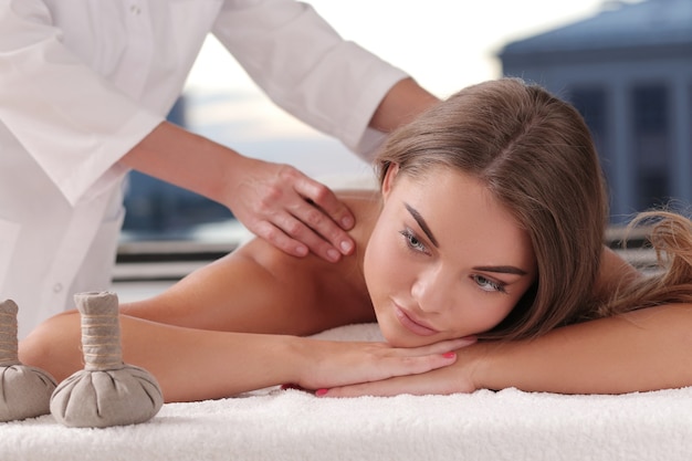 Blonde woman receiving a massage