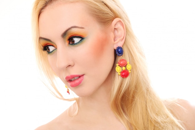 Free photo blonde woman showing her cute colored look