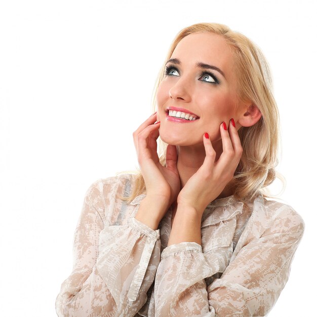 Blonde woman smiling on white