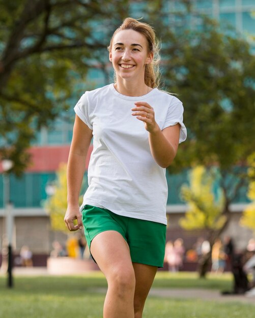 Blonde woman in sportswear running