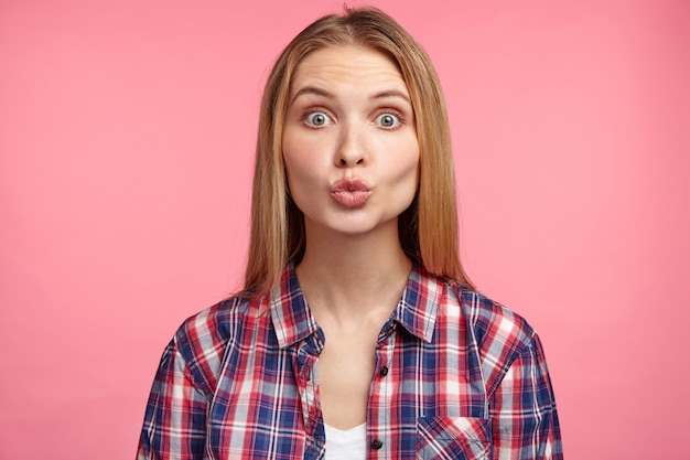 Blonde woman in striped shirt