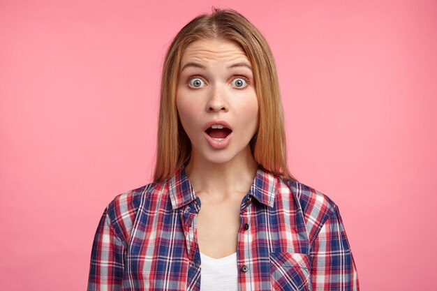 Blonde woman in striped shirt