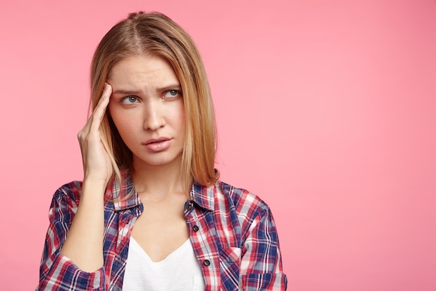 Free photo blonde woman in striped shirt