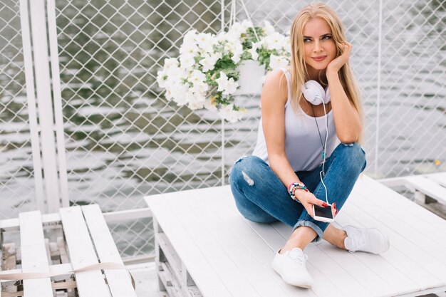 Blonde woman on table