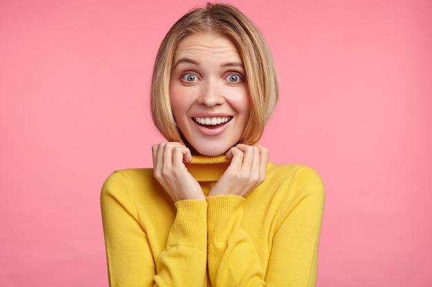 Blonde woman in turtleneck sweater