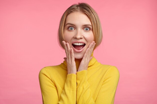 Blonde woman in turtleneck sweater