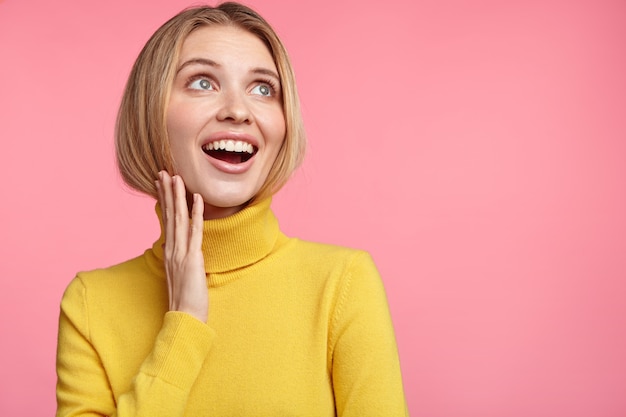 Blonde woman in turtleneck sweater