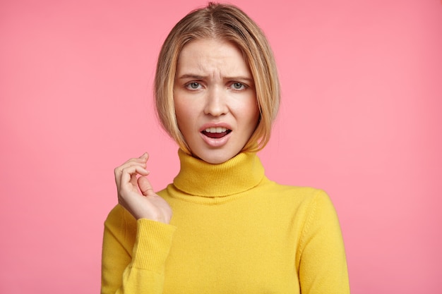 Free photo blonde woman in turtleneck sweater