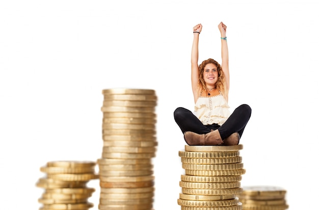 Blonde woman with columns of coins