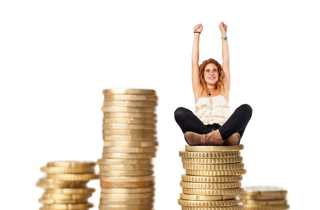 Blonde woman with columns of coins