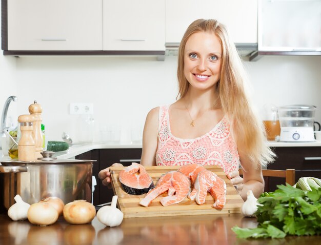 Blonde woman with salmon