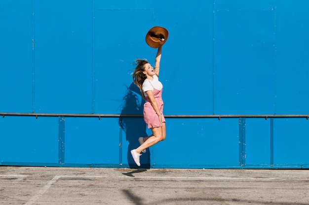 Blonde young girl in the amusement park