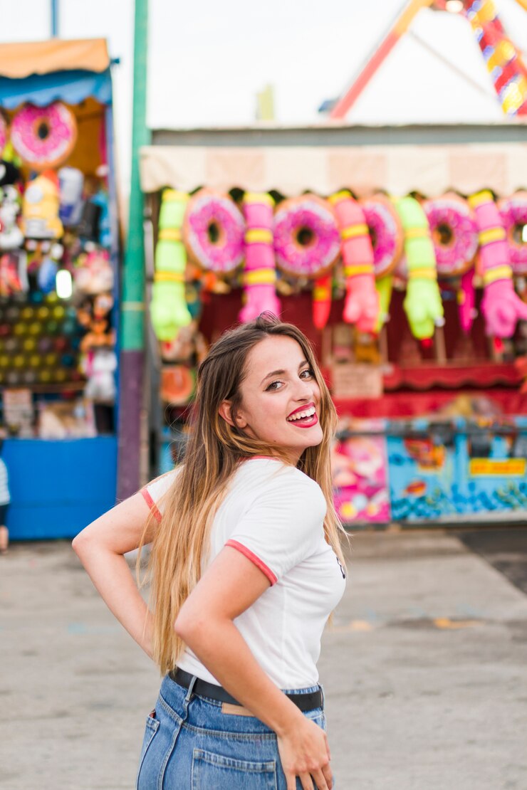 Free Photo blonde young girl in the amusement park