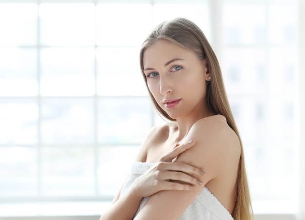 Blonde young woman posing