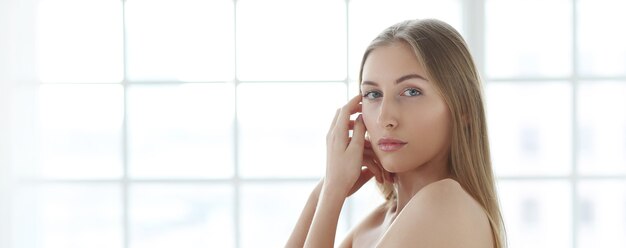 Blonde young woman posing