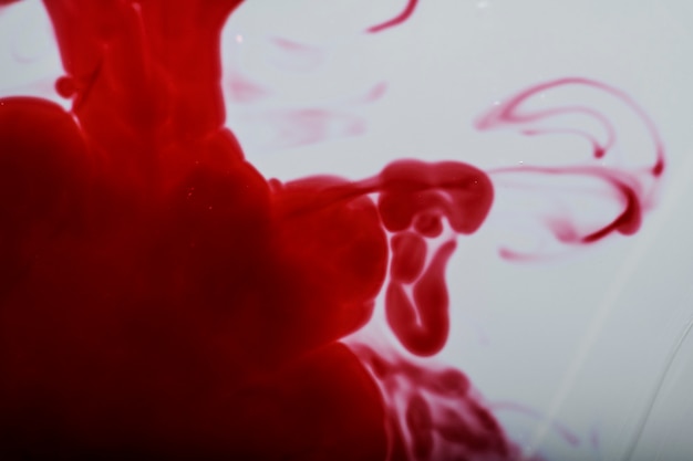 Free Photo blood drops on water